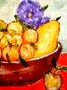 Gamella di frutte con un fiore